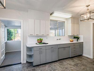 Kitchen with adjoining sunroom