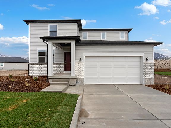 The Bryce floorplan exterior image taken at a Meritage Homes Community in Tooele, UT.