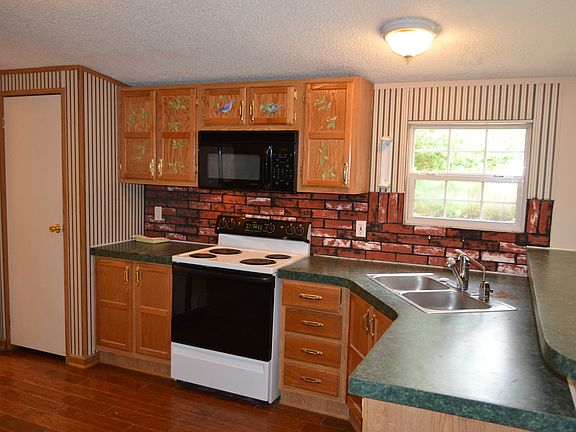 Open Kitchen with hardwood floors