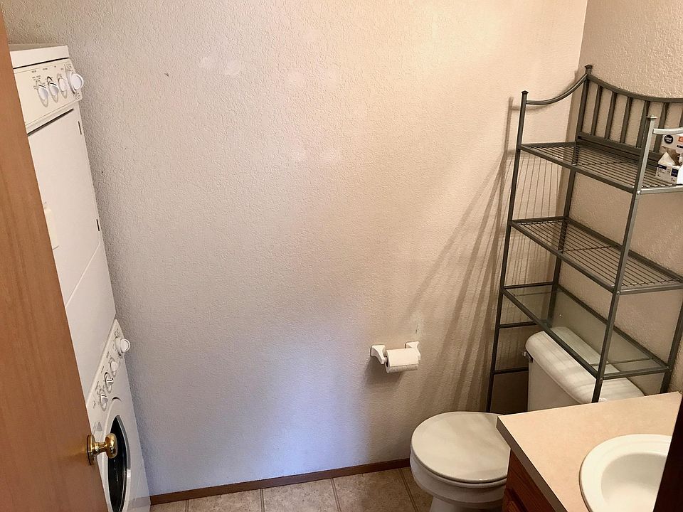 1/2 bath with front load washer/drier