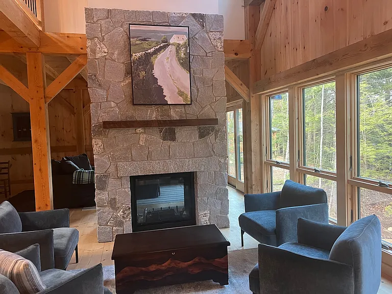 Two-sided gas fireplace. This is in the main room that includes the kitchen and dining area.