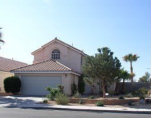 Corner lot, Pool, Desert landscaped, Well maintained home.