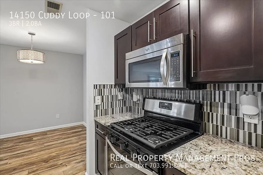 Sun-Filled Corner Condo with Wraparound Patio with Scenic Views! — Photo 4