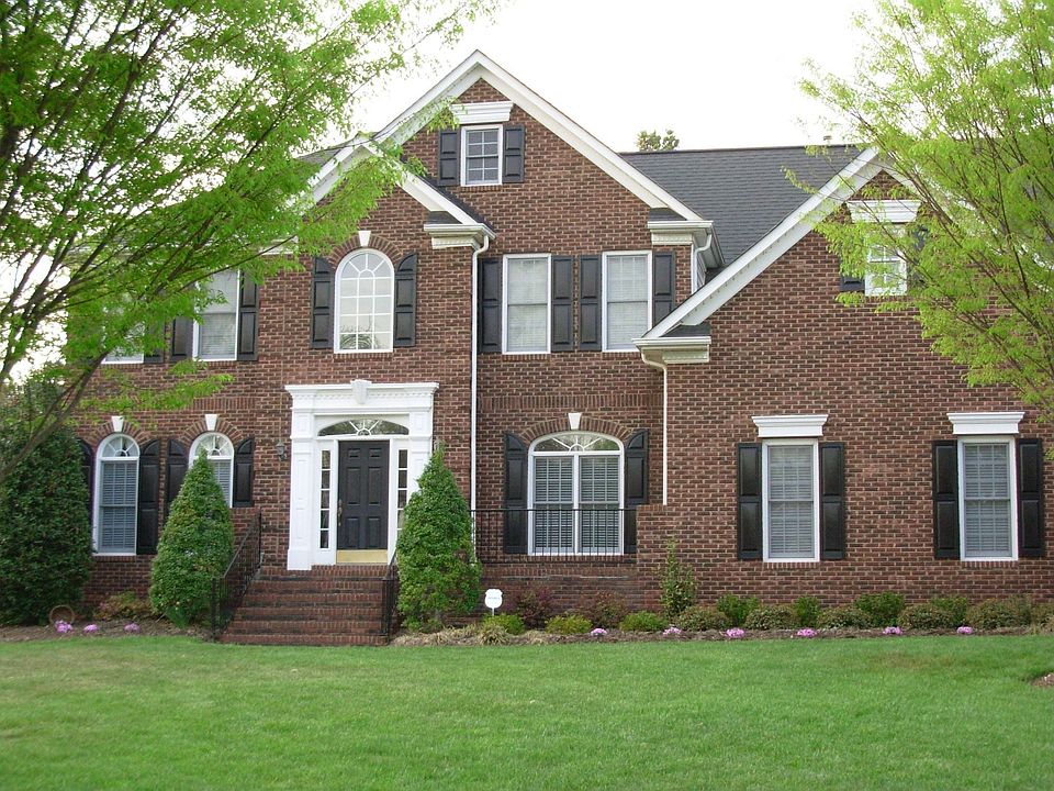 This house sits up from the street w/ great curb appeal