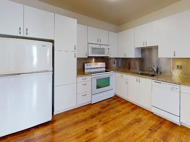 Ample kitchen storage with cabinetry and pantry space