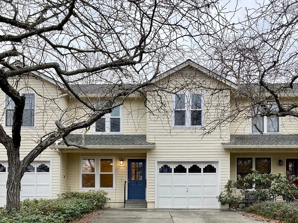 Welcoming exterior with newly painted front door. Garage with automatic door opener.