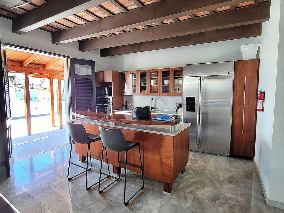kitchen, double doors leading out to terrace