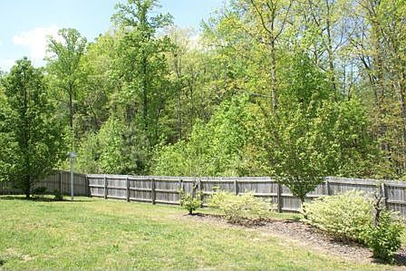 Private fenced in backyard