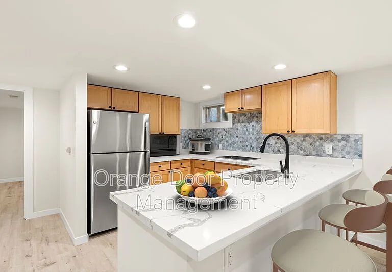 7727 Jones Ave NW — Photo 1