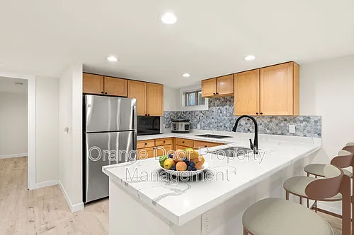 7727 Jones Ave NW Photo 1