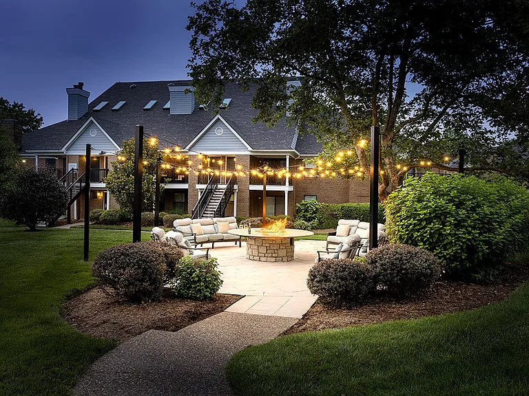Outdoor fireplace with lounge seating