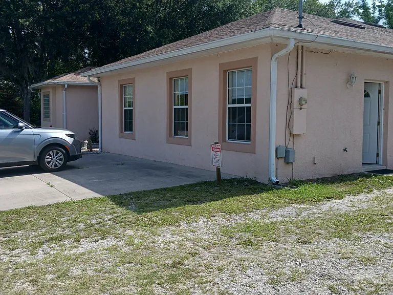 Side entrance and parking on side. 3 front windows that let in plenty of light.