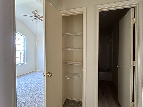 Hallway left from when you enter the house w/ small storage closet