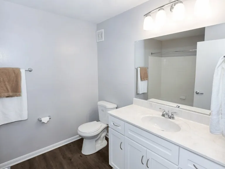 Experience luxury and simplicity in this elegantly designed bathroom.