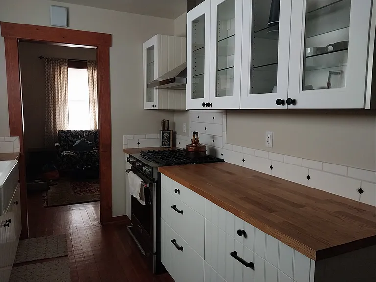 Full kitchen with butcher block countertops