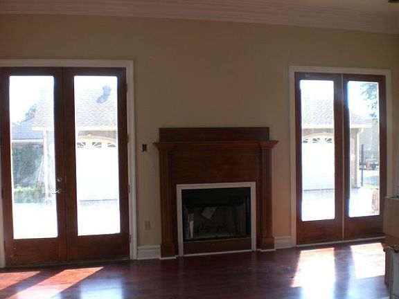 Wood burning fireplace in den