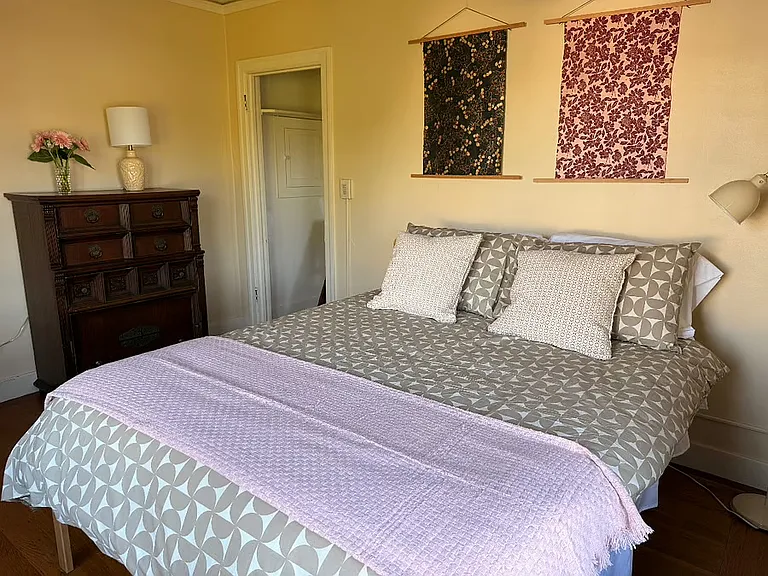 All rooms have new mattresses, a vintage dresser, and a laptop desk.