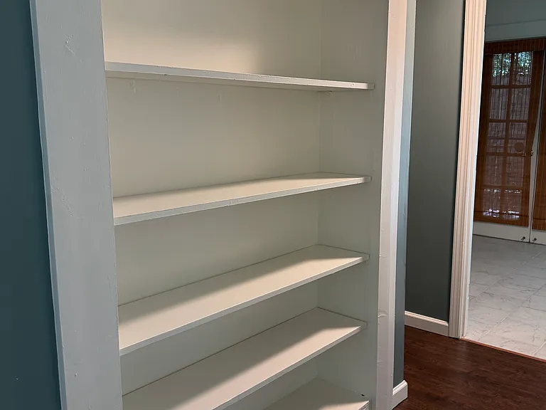 Built in bookshelf, downstairs.