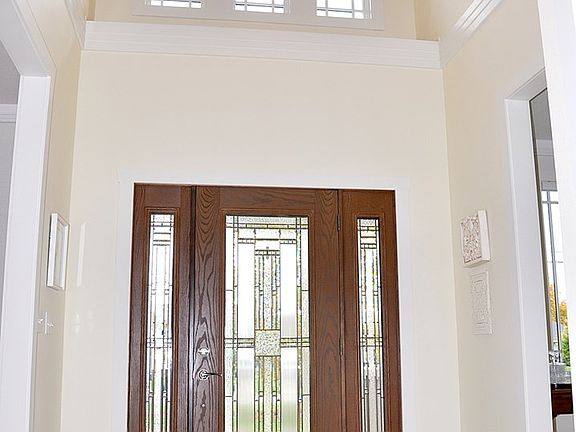 2 Story Foyer w/ Travertine