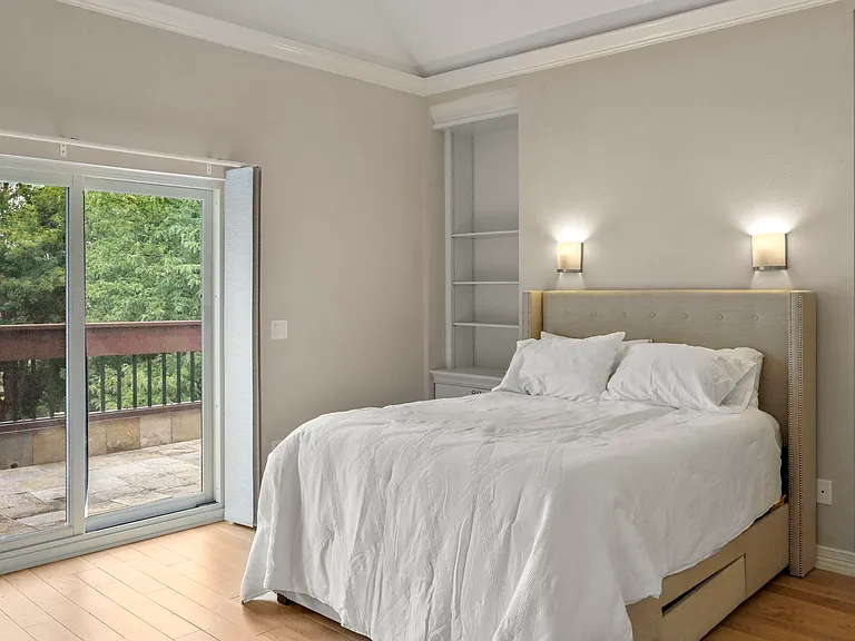 3rd Floor master bedroom with access to balcony
