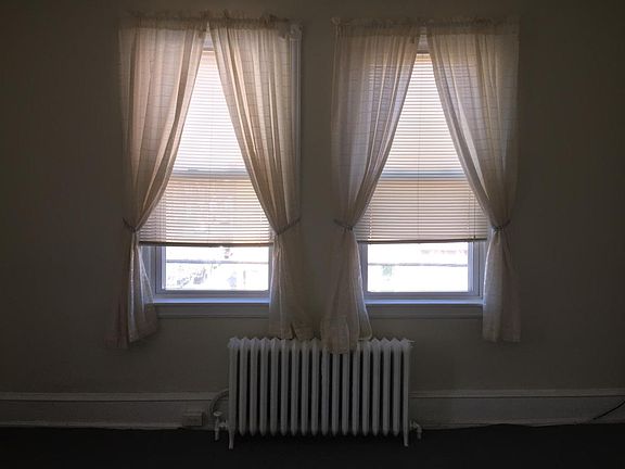 Living room windows facing Porter Street