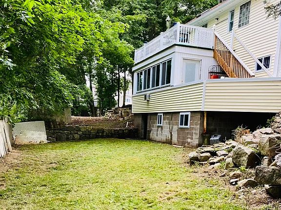 Rear balcony and large yard
