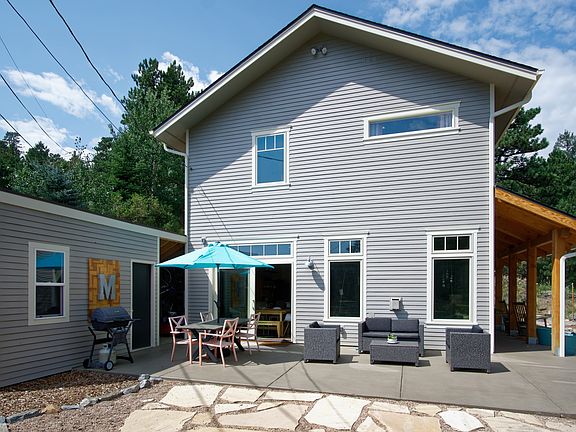 Side patio for enjoying beautiful evenings listening to the