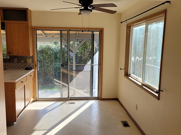 Dining room area, with sliding door for backyard/patio access
