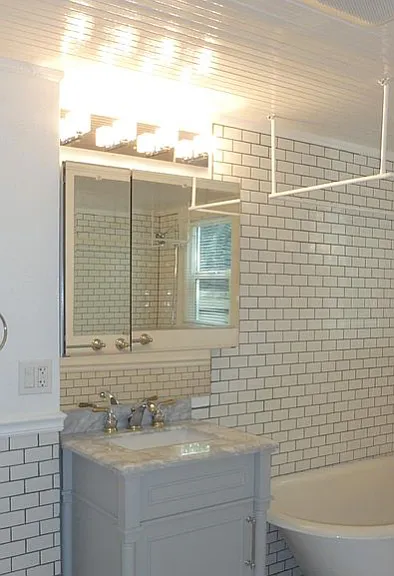 Subway tiled bath with new, vintage-style fixtures