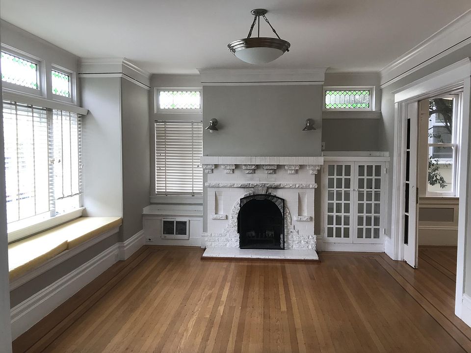 Living room looking at Fireplace and dining room