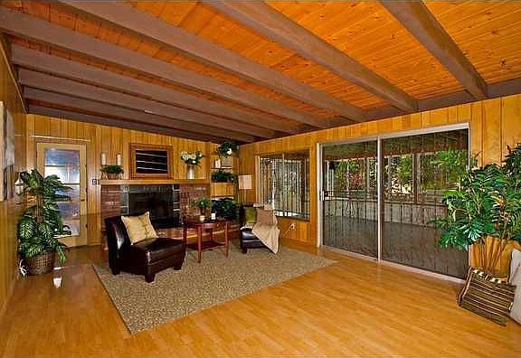 Den/Family/Great Room:  The oversized family room opens to the screened porch,