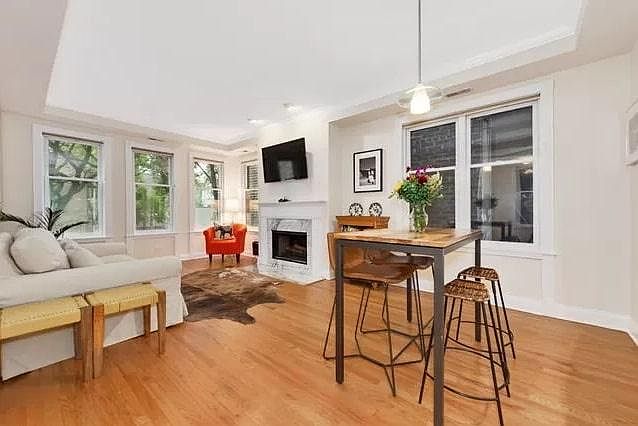Hardwood flooring, wood-burning fireplace, 9-foot ceilings