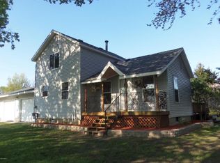 9390 N Derby Rd, Six Lakes, MI 48886