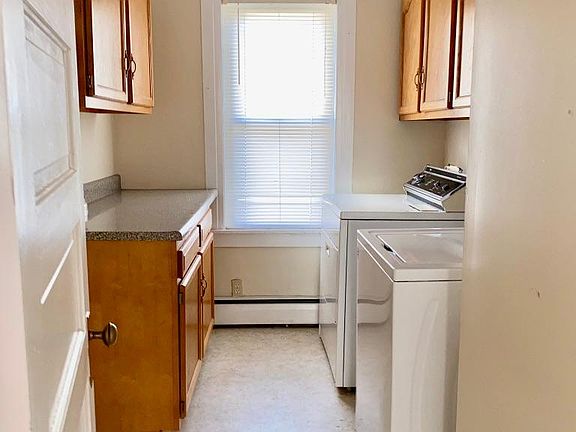 laundry room with washer and dryer