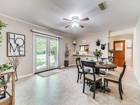 Separate family room with bar and pass through from kitchen.