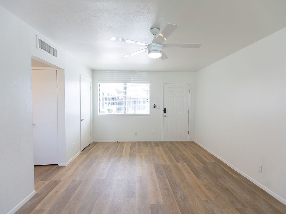 Large living space with wood look flooring
