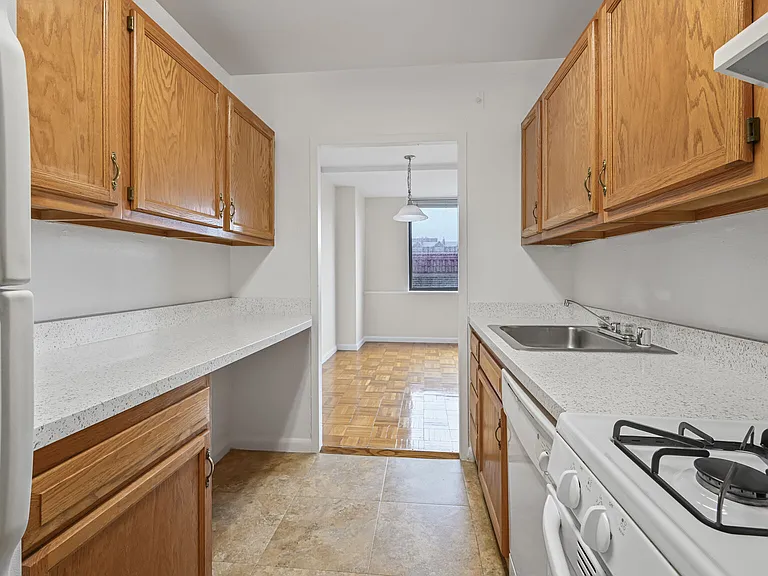 Galley Style Kitchen with Ample Cabinet Space