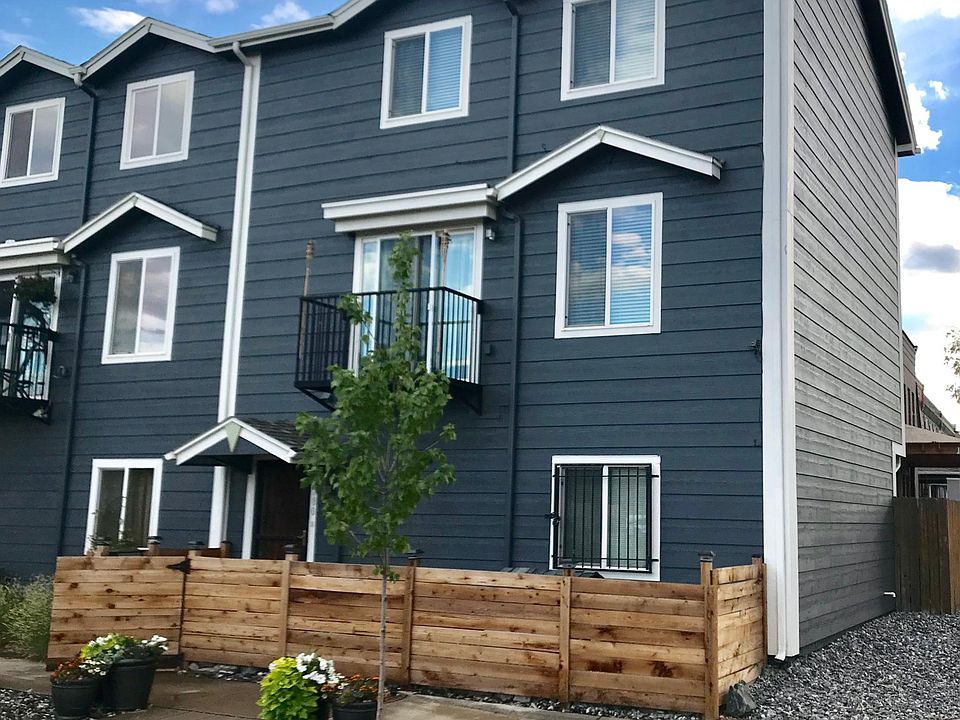 Large corner unit with two car garage and off street parking