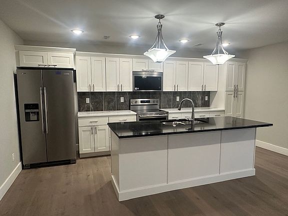 Spacious Kitchen. Stainless appliances.
