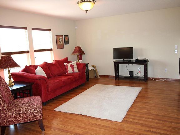 Family room with built in entertainment center and gas fireplace