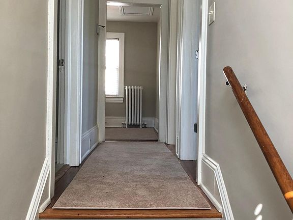 Hallway, bathroom to the left, first bedroom to the right