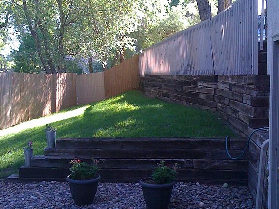 Big fenced backyard, great for BBQ (provided), or enjoying t