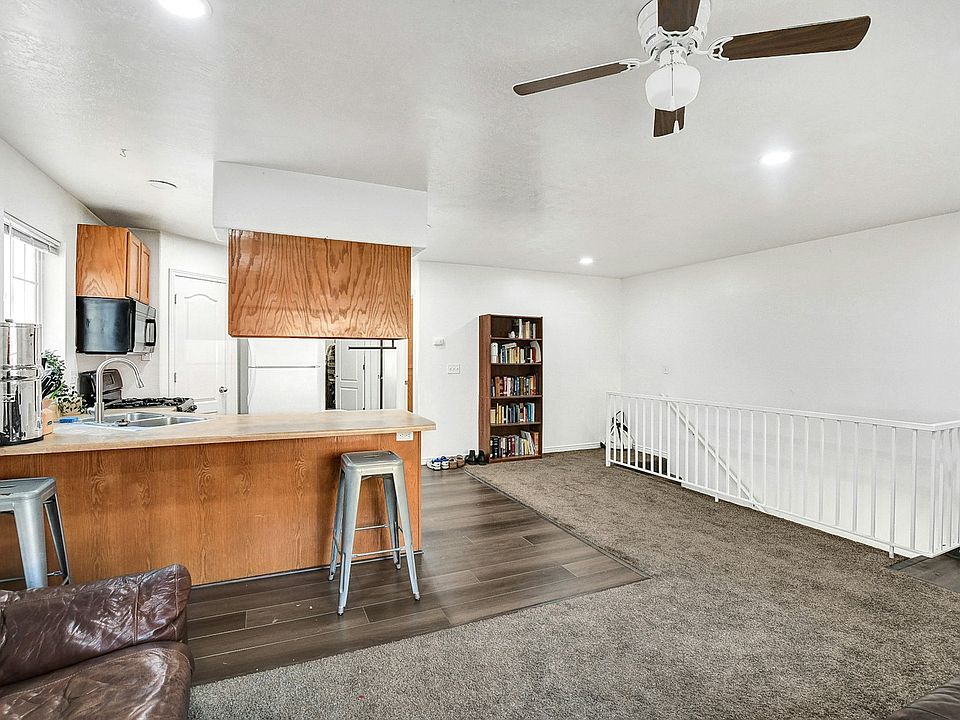stairs go down to another bedroom/bath
