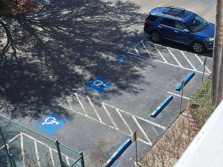 4 Handicapped parking spots and lot