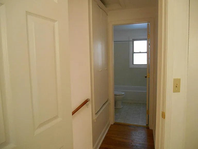 hallway to bathroom
