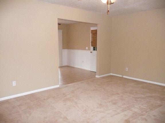 LIVING ROOM ENTRANCE TO KITCHEN