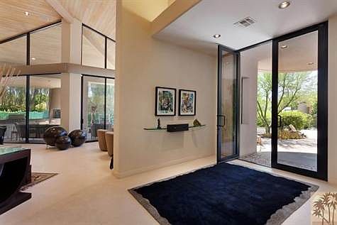 Entrance - notice the quality of the stone flooring and the wooden coved ceilings