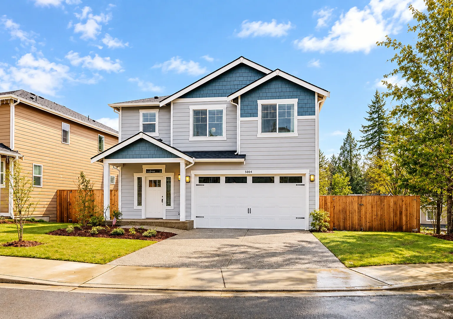 Modern 4BR Corner-Lot Home with Deck & Surrounding Views — Photo 1