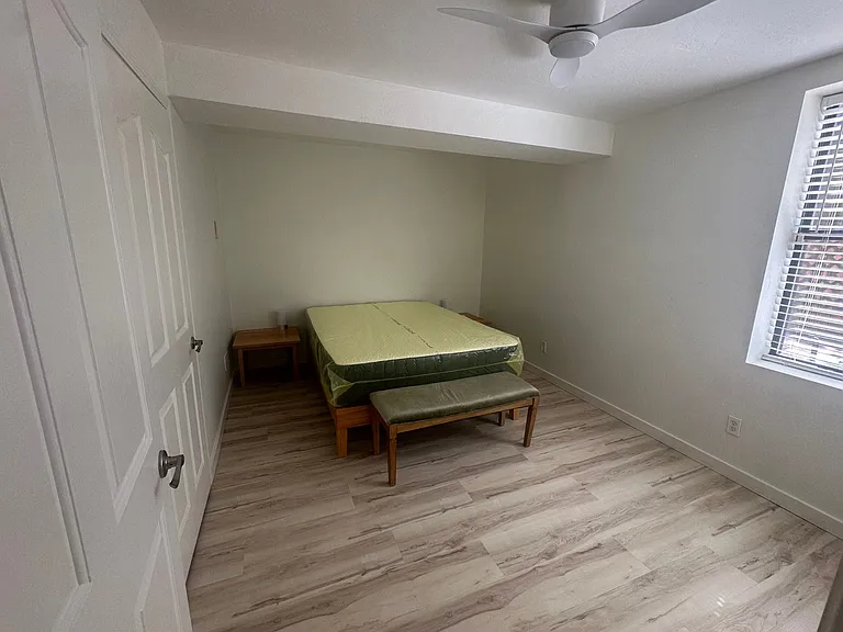 Queen size bed with new mattress. new, quiet ceiling fan. New luxury vinyl flooring and fresh paint.