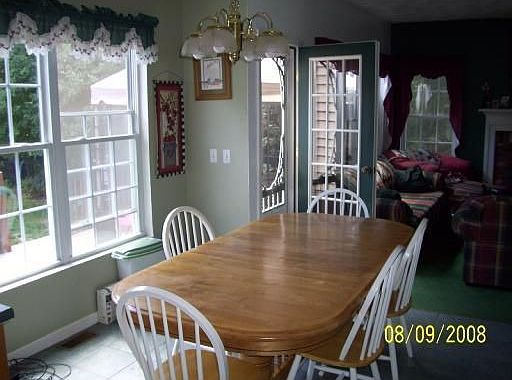 START YOUR DAY IN THIS BRIGHT KITCHEN OVERLOOKING MANICURED GROUNDS